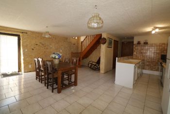 the perfectly fitted kitchen with dining area 