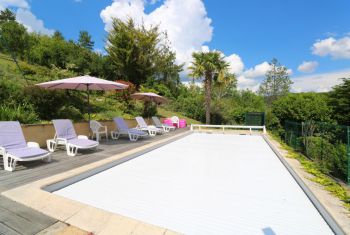 the pool has an electric cover for safety