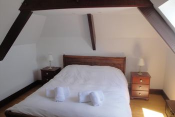 The double bedroom on the first floor of the main house