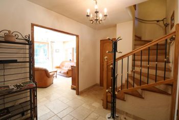 the enrance hall leading to the toilet, bathroom and double bedroom