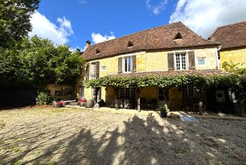 the front side of the house from the parking area 