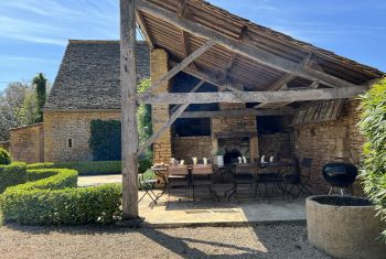 The roofed terrace set under the bread oven barn 